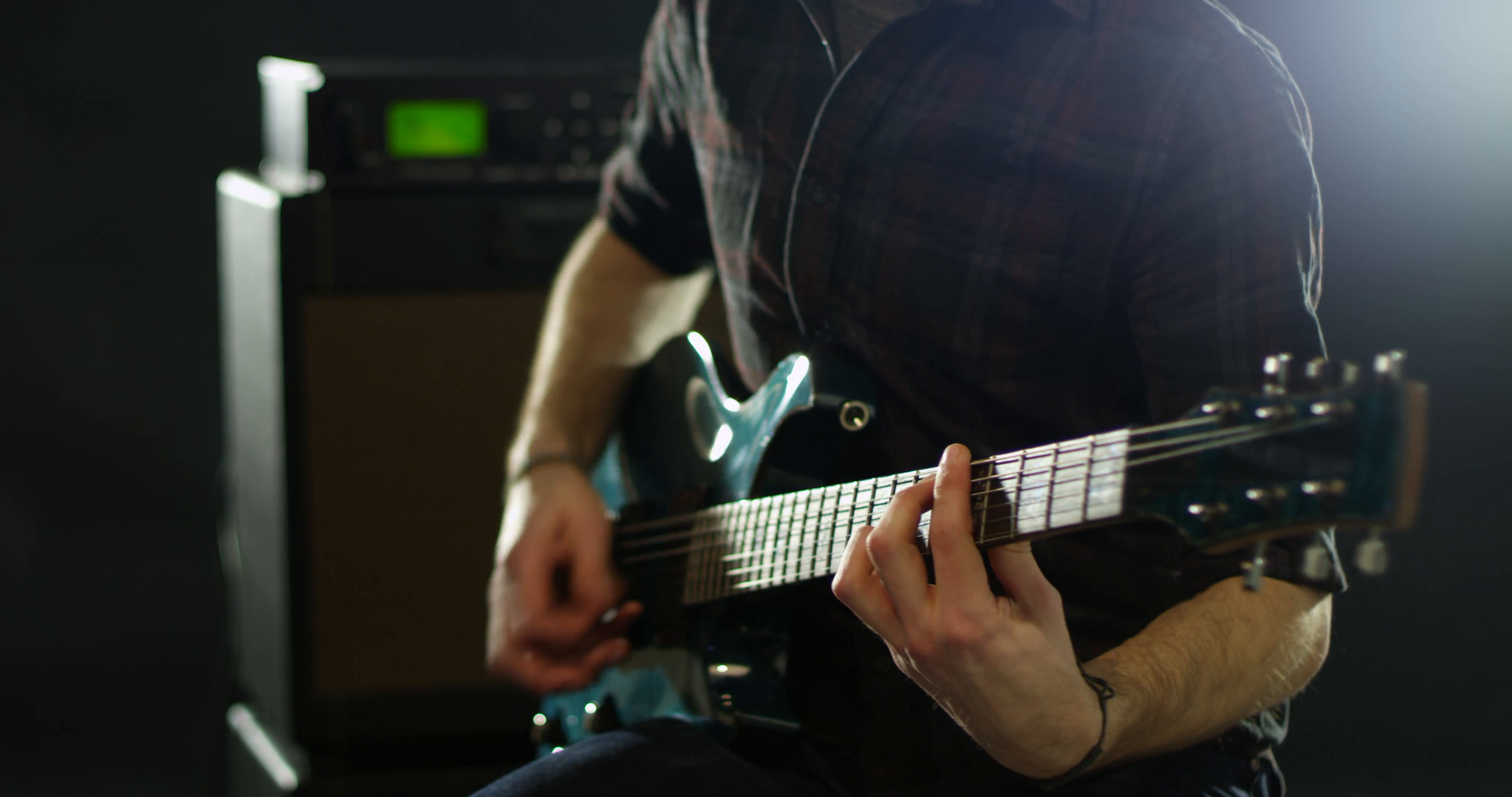 close-up-of-man-playing-electric-guitar-shot-on-r3d_b1myhppb__f0000